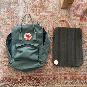 Used forest green Fjällräven Kånken backpack